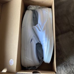 brand new white slip on vans